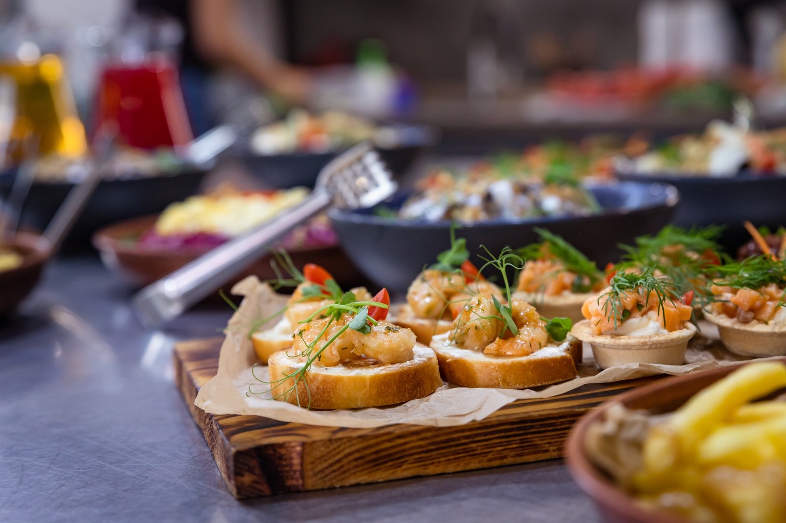 Banquet table served for holiday with canape and different snacks. European food. Catering.